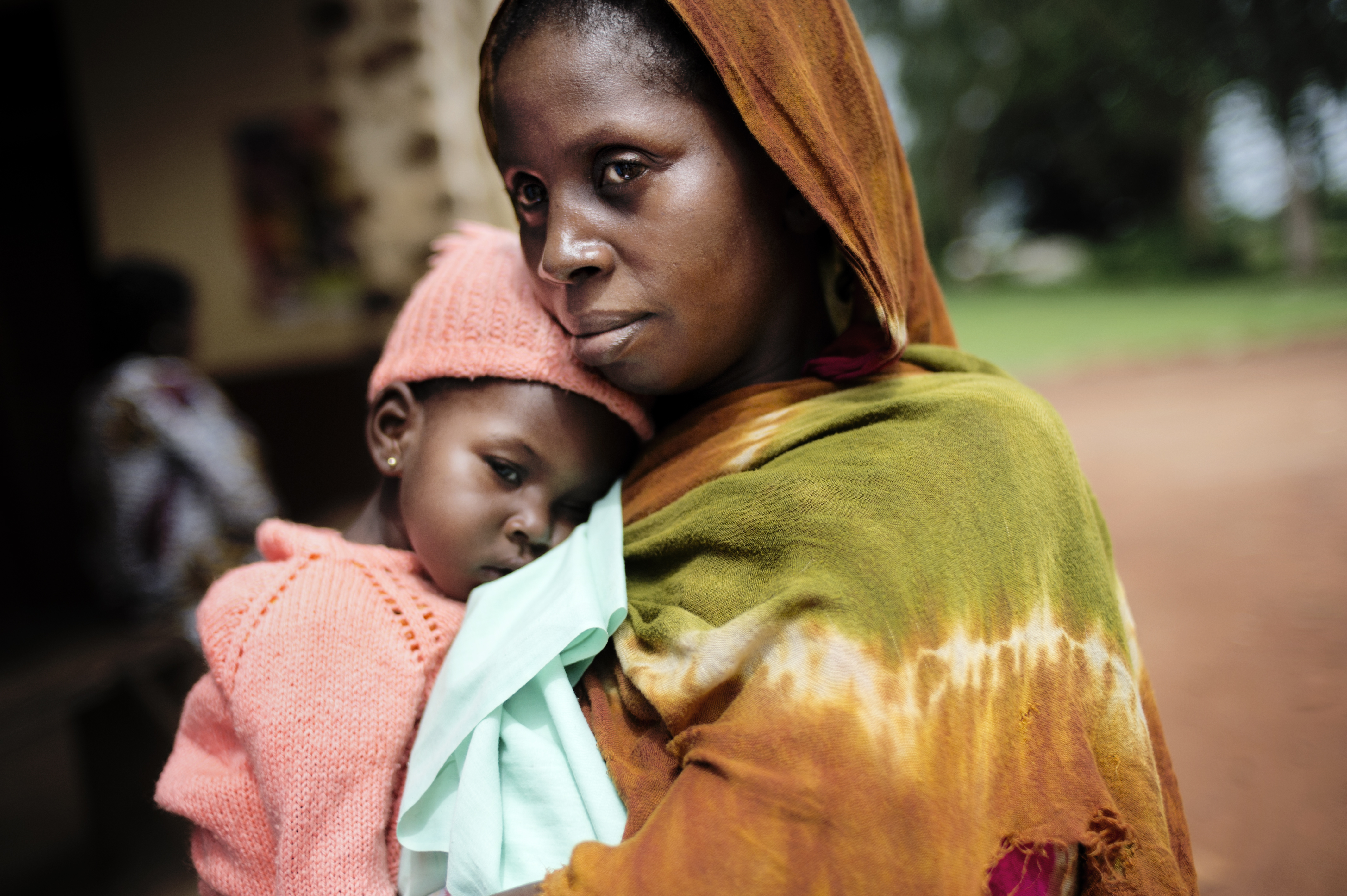 Woman with child in her arms